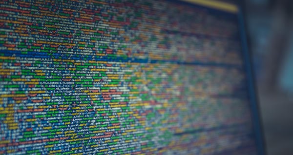 Computer screen displaying colorful code and data analysis.