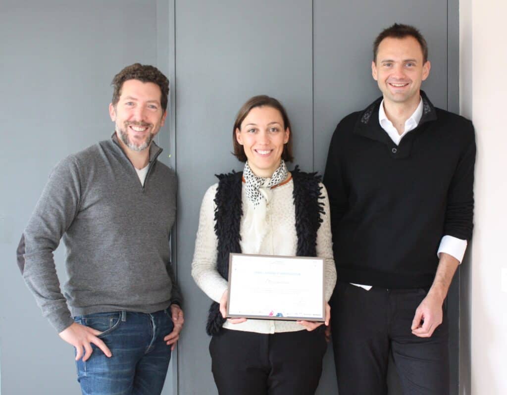 Data analytics team celebrating achievement at Quantilia.